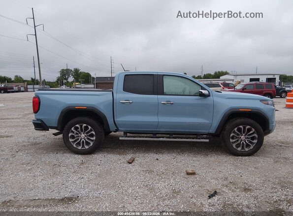 1GTP2FEK0T1192959 2026 GMC CANYON Blue Widok wnętrza z tyłu