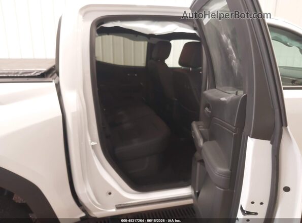 1GTP6BEK3R1252383 2024 GMC CANYON White VIN կոդի պիտակի տեսք
