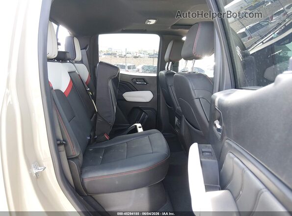 1GTP6EEK3R1224780 2024 GMC CANYON Beige Vista de la etiqueta del VIN
