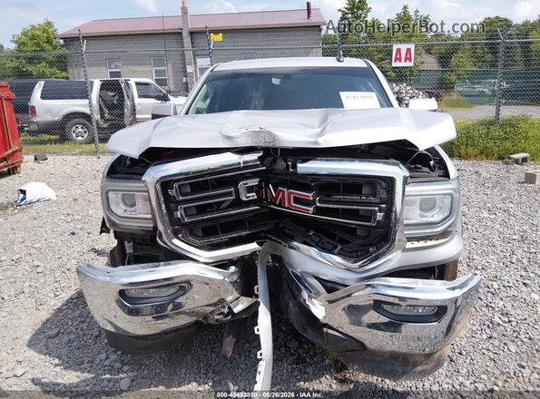 1GTV2MEH2GZ198575 2016 GMC SIERRA Silver Սալոնի հետևի տեսք