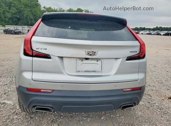 1GYAZAR44NF100199 2022 CADILLAC XT4 Silver Вид ззаду