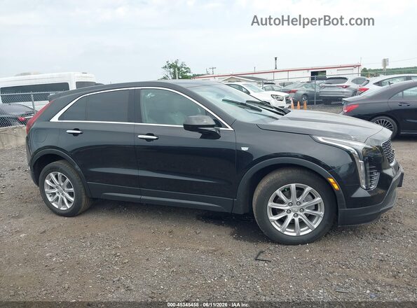 1GYAZAR44PF103638 2023 CADILLAC XT4 Black Widok wnętrza z tyłu