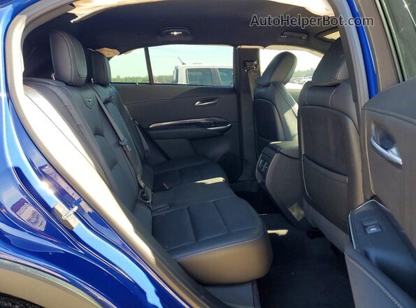 1GYAZAR45PF120237 2023 CADILLAC XT4 Blue Вид задньої частини салону