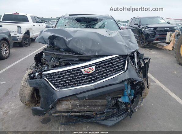 1GYAZAR46RF115373 2024 CADILLAC XT4 Black Սալոնի հետևի տեսք
