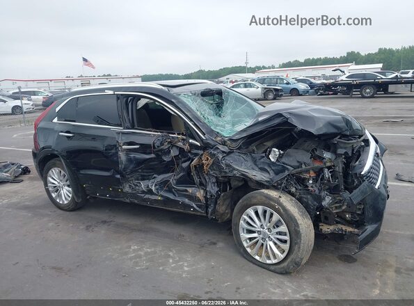 1GYAZAR46RF115373 2024 CADILLAC XT4 Black Սալոնի 360 աստիճան տեսք