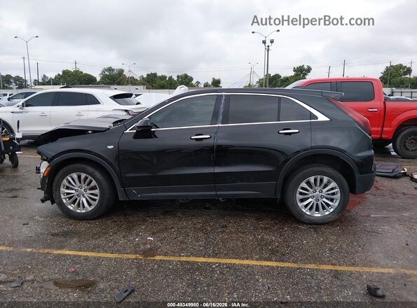 1GYAZAR46RF143660 2024 CADILLAC XT4 Black 