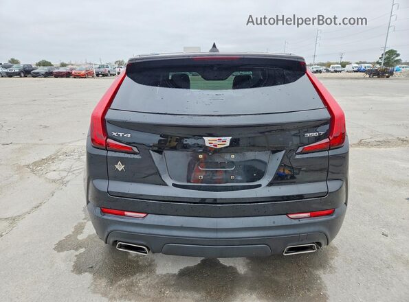 1GYAZAR4XMF026799 2021 CADILLAC XT4 Black 