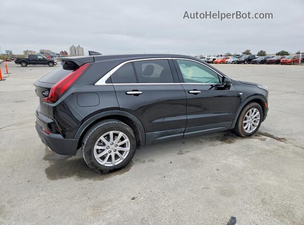 1GYAZAR4XMF026799 2021 CADILLAC XT4 Black 