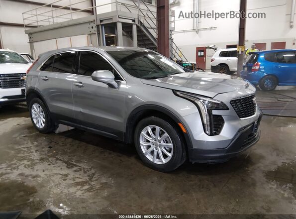 1GYFZBR49PF156041 2023 CADILLAC XT4 Gray Vista interior trasera