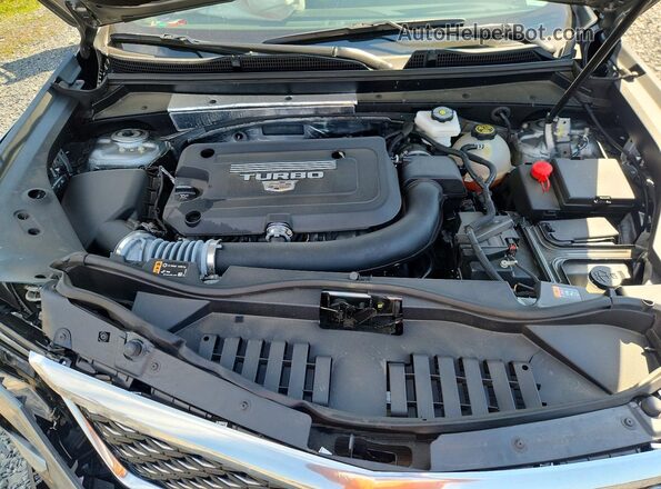 1GYFZBR49RF107781 2024 CADILLAC XT4 Silver Vista del compartimento del motor