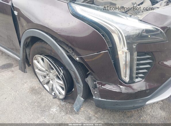 1GYFZCR49MF039383 2021 CADILLAC XT4 Maroon Vista frontal