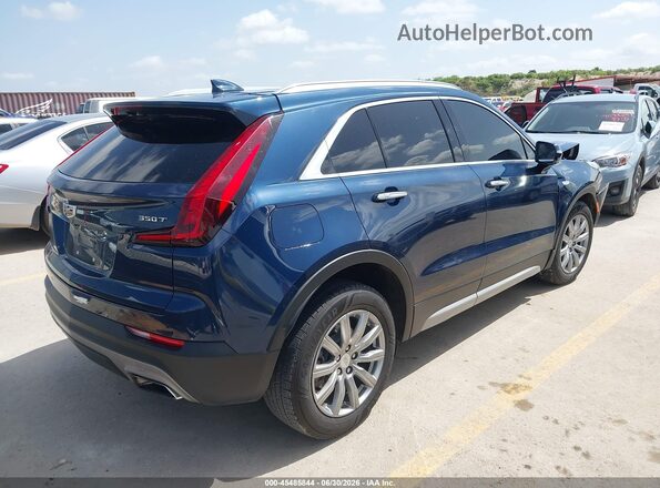 1GYFZCR4XLF111092 2020 CADILLAC XT4 Blue Trasero derecho