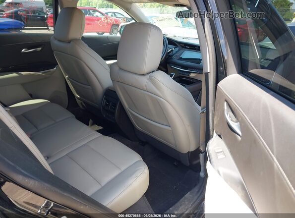 1GYFZDR40MF082080 2021 CADILLAC XT4 Black VIN sticker view