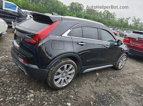 1GYFZDR41LF049538 2020 CADILLAC XT4 Black Trasero derecho