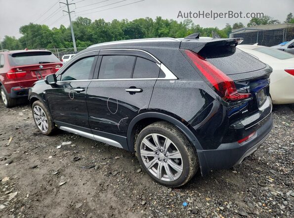1GYFZDR41LF049538 2020 CADILLAC XT4 Black Trasero izquierdo