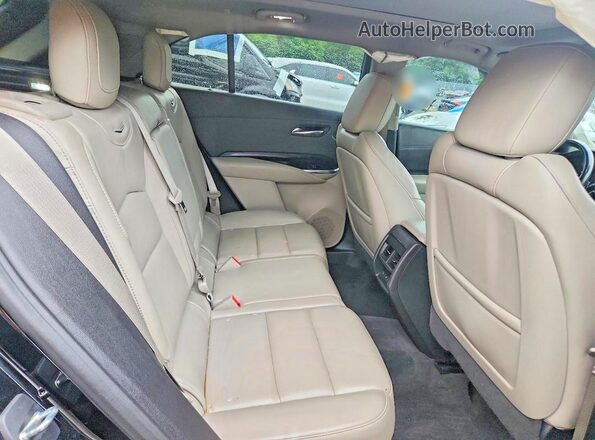 1GYFZDR41LF049538 2020 CADILLAC XT4 Black Vista interior trasera