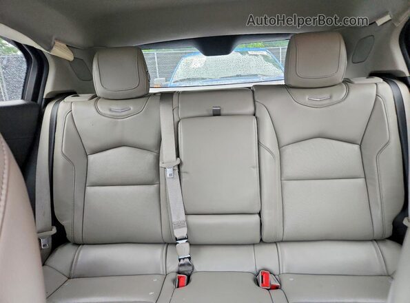 1GYFZDR41LF049538 2020 CADILLAC XT4 Black Vista de los asientos traseros