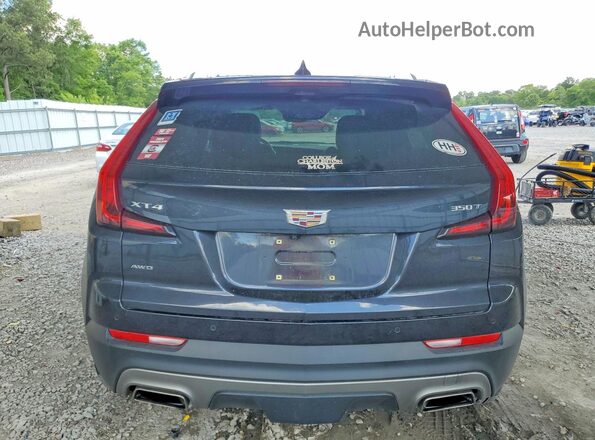 1GYFZDR41NF139968 2022 CADILLAC XT4 Black Вид ззаду