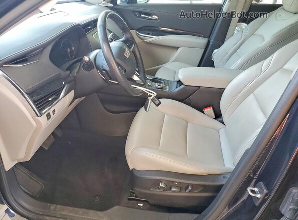 1GYFZDR41NF139968 2022 CADILLAC XT4 Black Вид салону спереду