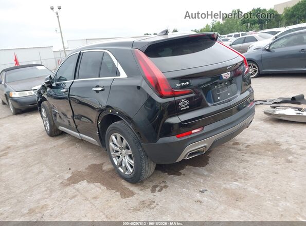 1GYFZDR41PF160208 2023 CADILLAC XT4 Black Trasero izquierdo