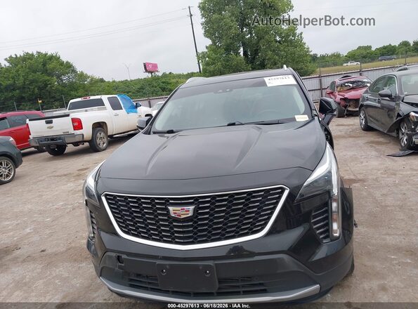 1GYFZDR41PF160208 2023 CADILLAC XT4 Black Vista interior trasera