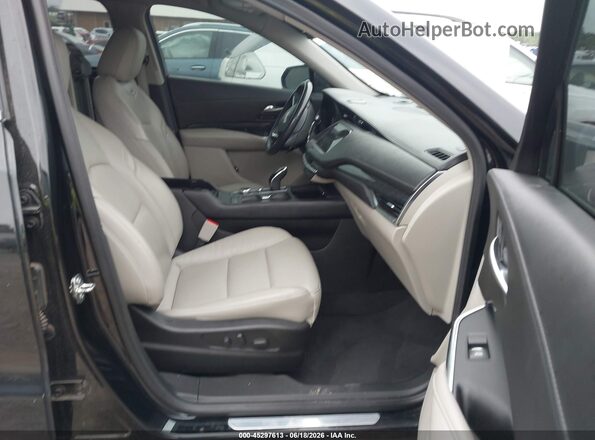 1GYFZDR41PF160208 2023 CADILLAC XT4 Black Vista interior delantera