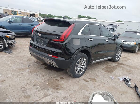 1GYFZDR41PF160208 2023 CADILLAC XT4 Black Trasero derecho