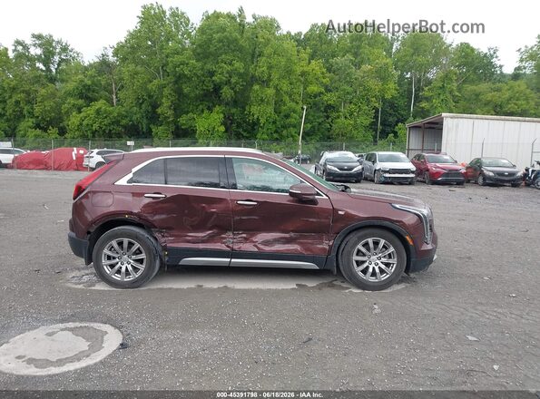 1GYFZDR42PF101085 2023 CADILLAC XT4 Burgundy უკანა სალონის ხედი