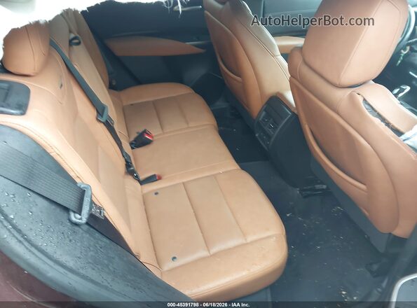 1GYFZDR42PF101085 2023 CADILLAC XT4 Burgundy VIN კოდის სტიკერის ხედი