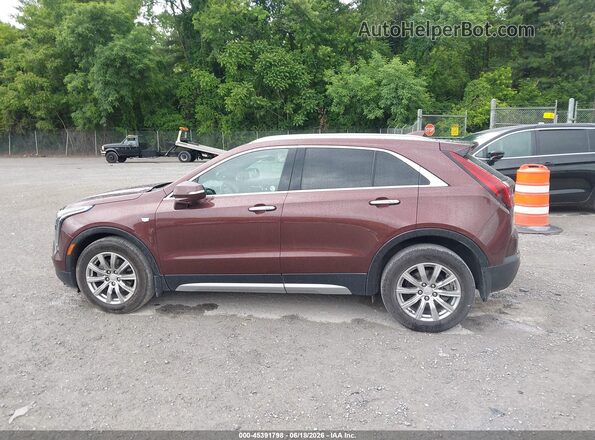 1GYFZDR42PF101085 2023 CADILLAC XT4 Burgundy სალონის 360-გრადუსიანი ხედი