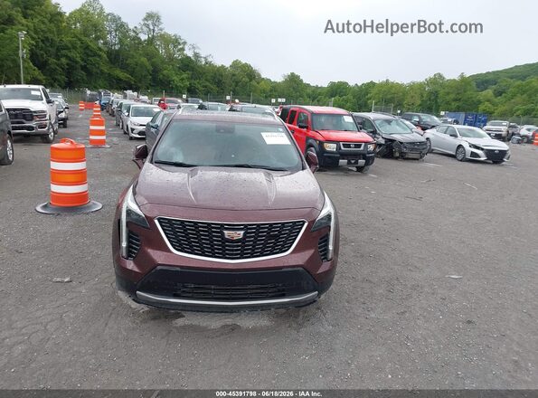 1GYFZDR42PF101085 2023 CADILLAC XT4 Burgundy ხელსაწყოთა პანელის ხედი