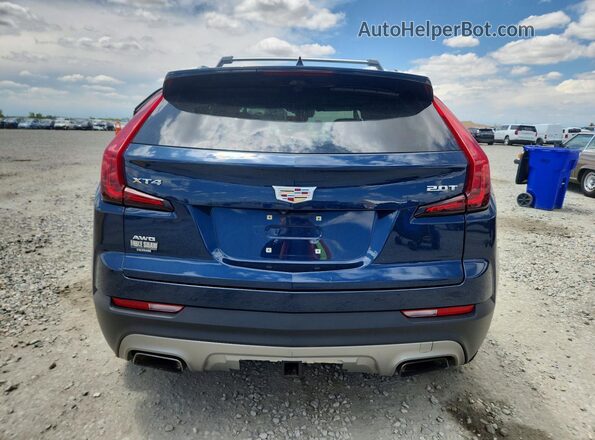 1GYFZDR43KF226458 2019 CADILLAC XT4 Blue Вид ззаду