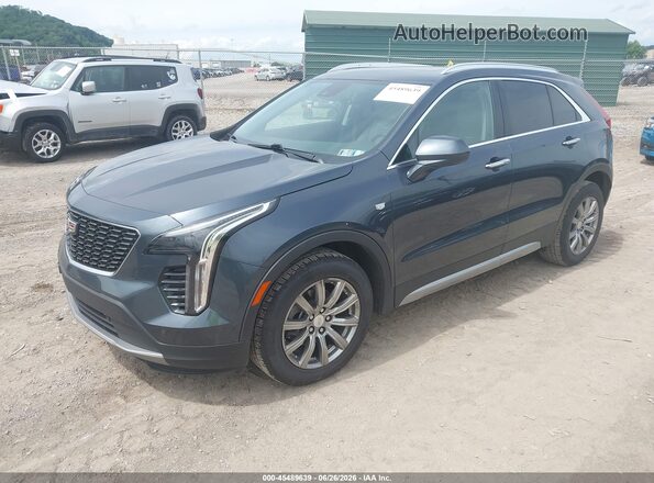 1GYFZDR43LF132520 2020 CADILLAC XT4 Blue Առջևի ձախ երեք քառորդ տեսարան