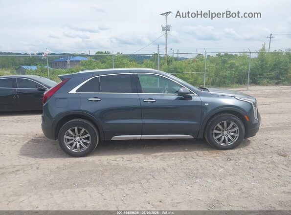 1GYFZDR43LF132520 2020 CADILLAC XT4 Blue Սալոնի հետևի տեսք