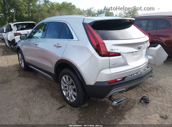 1GYFZDR44NF131945 2022 CADILLAC XT4 Silver Trasero izquierdo