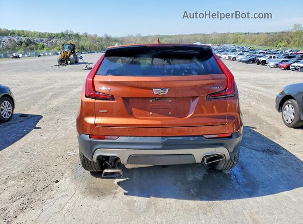 1GYFZDR45MF003793 2021 CADILLAC XT4 Orange Հետևի տեսք