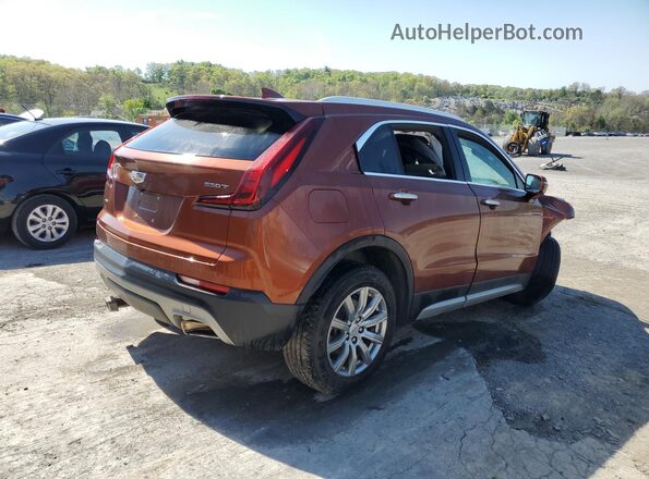 1GYFZDR45MF003793 2021 CADILLAC XT4 Orange 