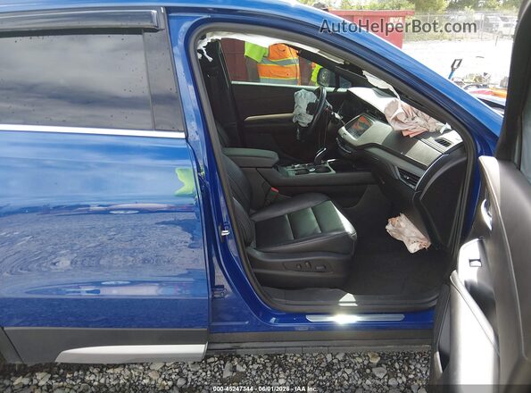 1GYFZDR45PF202170 2023 CADILLAC XT4 Blue Вид салону спереду