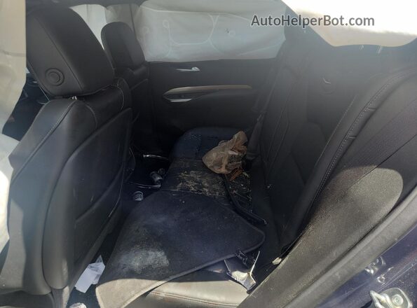 1GYFZDR45RF198026 2024 CADILLAC XT4 Синий Вид задней части салона