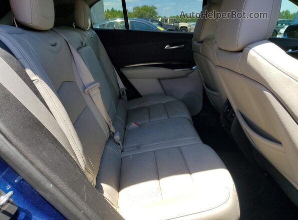 1GYFZDR46KF135457 2019 CADILLAC XT4 Blue Widok tylnych siedzeń