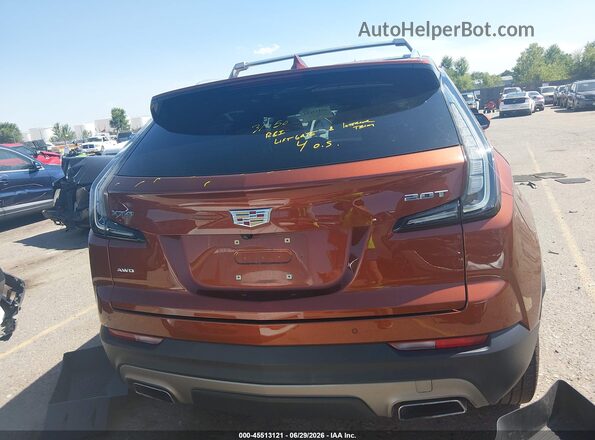 1GYFZDR48KF195305 2019 CADILLAC XT4 Orange 