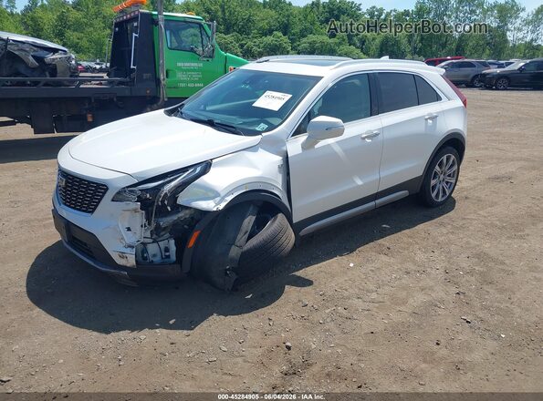 1GYFZDR49MF009628 2021 CADILLAC XT4 White Առջևի ձախ երեք քառորդ տեսարան