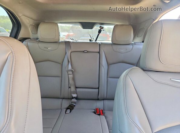 1GYFZDR49NF153326 2022 CADILLAC XT4 Red Vista de los asientos traseros