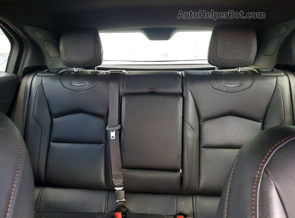 1GYFZER41LF033667 2020 CADILLAC XT4 Maroon Vista de los asientos traseros