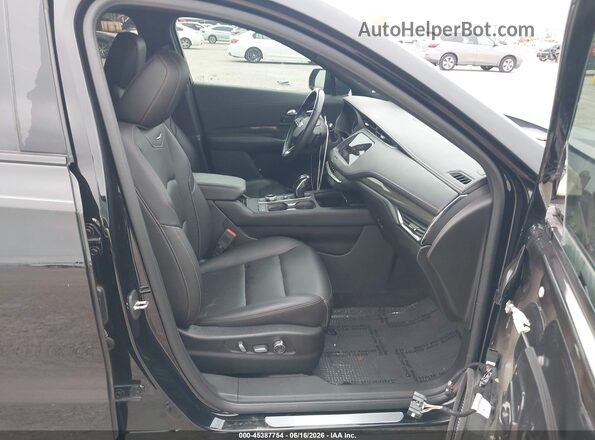 1GYFZER42KF174309 2019 CADILLAC XT4 Black წინა სალონის ხედი