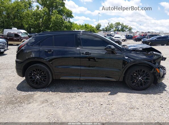 1GYFZER46RF102264 2024 CADILLAC XT4 Черный Вид задней части салона