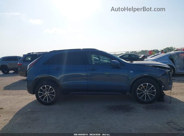 1GYFZER46SF138722 2025 CADILLAC XT4 Blue Вид задньої частини салону
