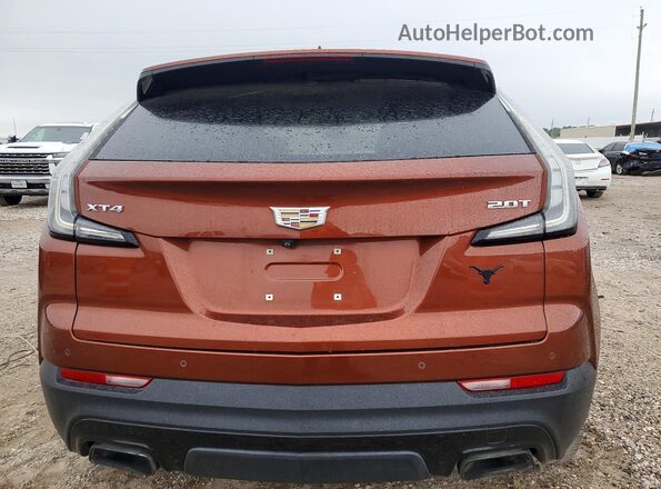 1GYFZER4XKF103522 2019 CADILLAC XT4 Orange Вид ззаду