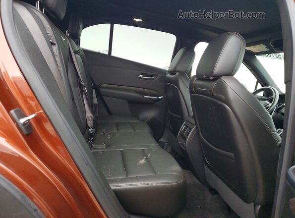 1GYFZER4XKF103522 2019 CADILLAC XT4 Orange Вид задніх сидінь