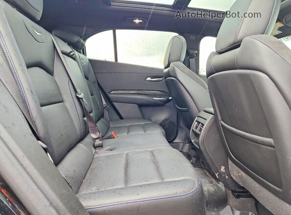 1GYFZER4XRF200620 2024 CADILLAC XT4 Black Widok tylnych siedzeń